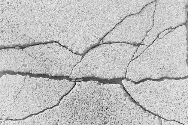 Grieta en el suelo fondo blanco / fondo vintage blanco abstracto textura rota