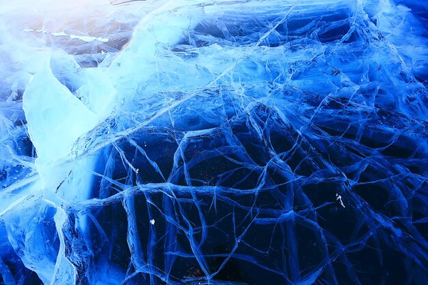 grietas de textura de hielo baikal, fondo abstracto hielo de invierno azul transparente