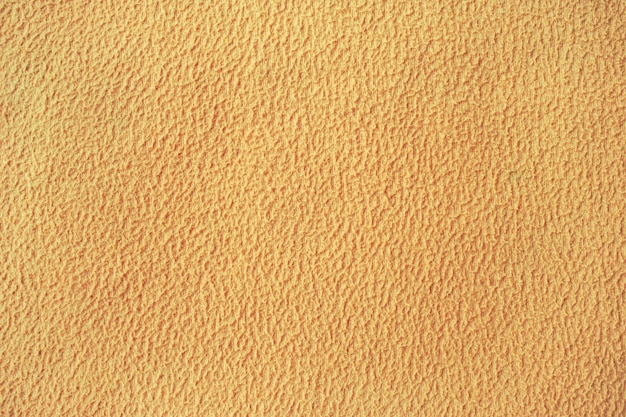 Foto grobe textur der pfirsichfarbenen decke