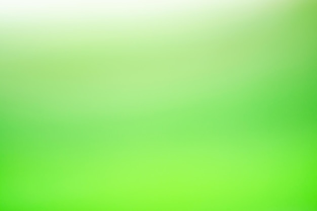 Grüne defokussierte Oberfläche mit Bokeh Unscharfer abstrakter grüner Hintergrund