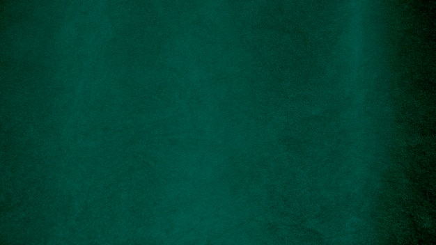 Grüne Samtstoffstruktur als Hintergrund verwendet Leerer grüner Stoffhintergrund aus weichem und glattem Textilmaterial Es gibt Platz für Text