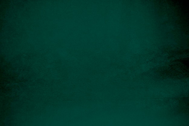 Foto grüne samtstofftextur als hintergrund verwendet smaragdfarbe panne stoffgrund aus weichem und glattem textilmaterial zerquetschtes samt luxus smaragdton für seide