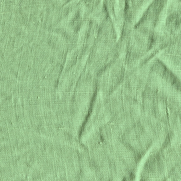 Grüne Stoffoberfläche für den Hintergrund Grüne Leinenstruktur Grüner Flachshintergrund