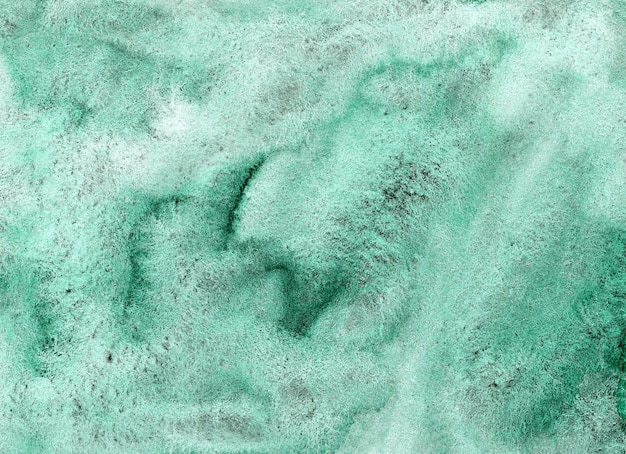 Grüner abstrakter Aquarellhintergrund auf strukturiertem Papier