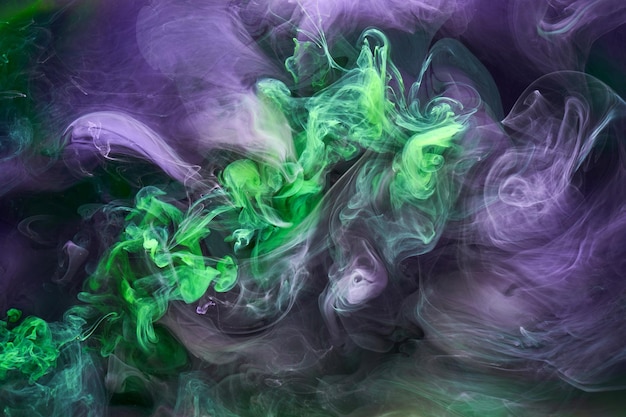 Grüner lila Rauch abstrakter Hintergrund Acrylfarbe Unterwasserexplosion