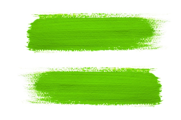 Grüner Pinselstrich auf Hintergrund isoliert