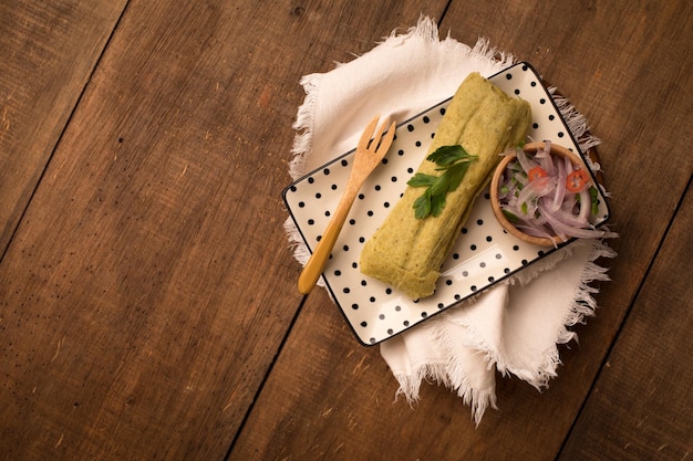 Grüner Tamal-Mais-Snack traditionelles peruanisches Essen