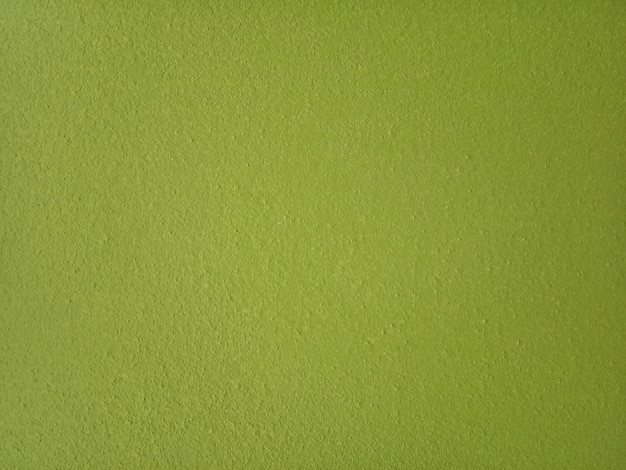 Grüner Zementwandhintergrund im Vintage-Stil