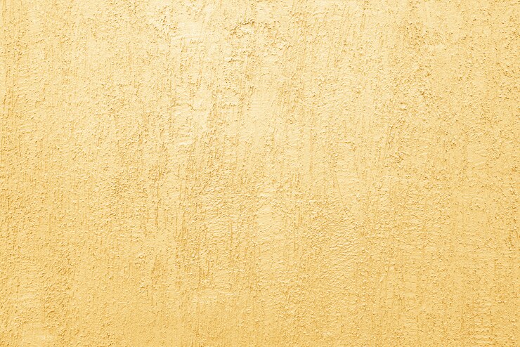 Grunge goldener Zementwandhintergrund
