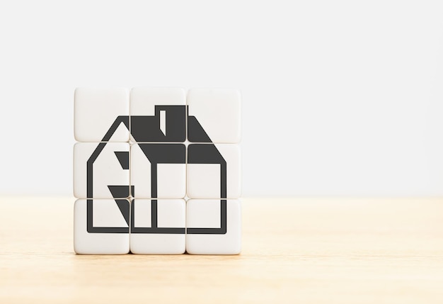 Grupo de blocos formando um ícone de casa Construção habitacional ou conceito imobiliário