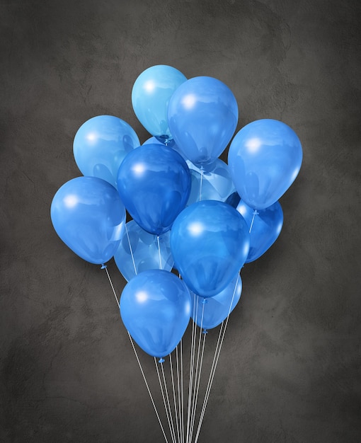 Grupo de globos de aire azul en una oscuridad