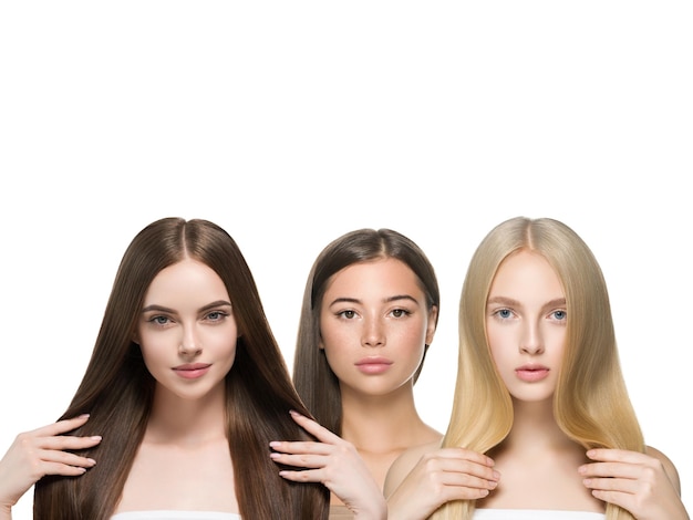 Grupo de mujeres de cabello hermoso concepto de belleza mujer con peinado largo de diferente color y moda aislado en blanco. Modelo de cabello rubio y morena rizado y suave. Tiro del estudio.