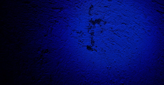 Gruselige dunkelblaue Grunge-Textur für den Hintergrund Dunkelblaues Wand-Horror-Konzept