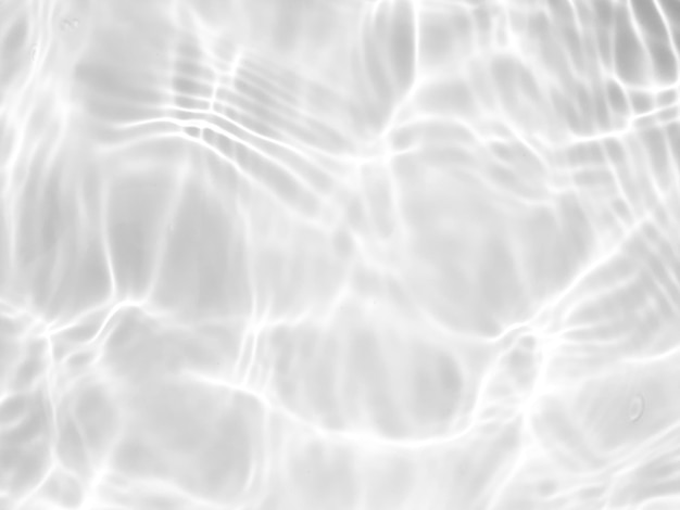 Água branca com ondulações na superfície Defocus turva água transparente de cor branca clara