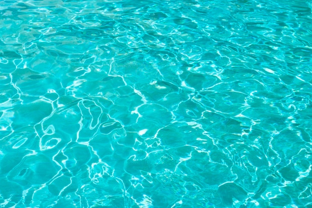 Água do mar azul ou água no fundo da textura da piscina