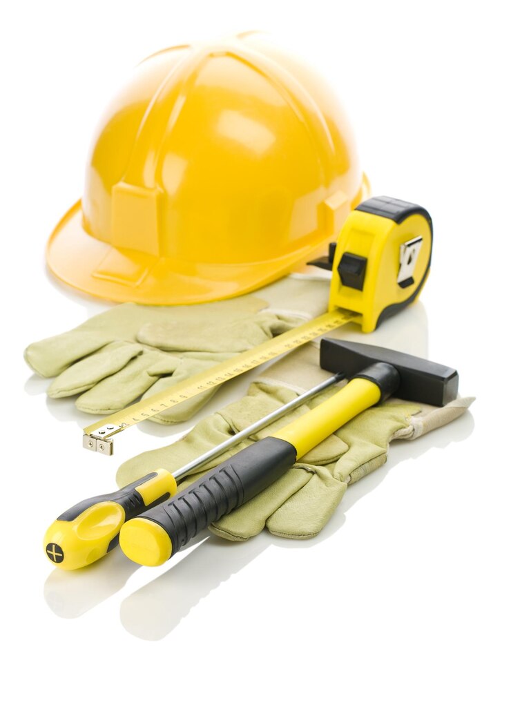 Foto guantes y herramientas para reparar