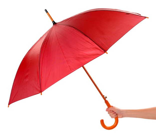 Guarda-chuva vermelho na mão isolado no branco