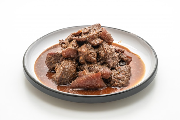 guisado de carne de porco com ervas