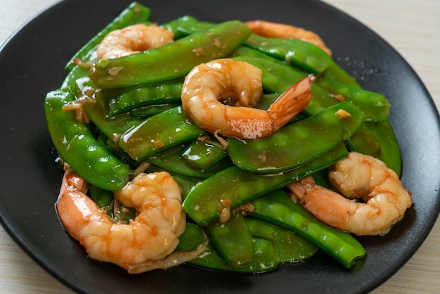 Guisantes salteados con gambas