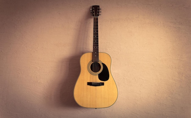 Foto guitarra acústica en la pared vintage de fondo beige