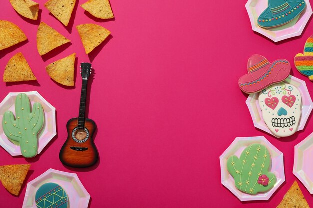 Foto guitarra decorativa con decoraciones para las vacaciones del cinco de mayo