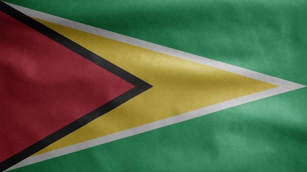 Guyanesische Flagge weht im Wind. Nahaufnahme von Guyana Banner weht, weiche und glatte Seide. Stoff Textur Fähnrich Hintergrund.