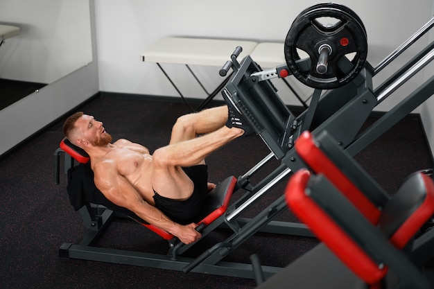 Gym Mann Beinpresse Maschine Training