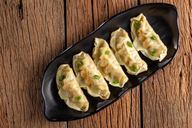 Gyoza oder Jiaozi Traditionelles chinesisches und japanisches Essen