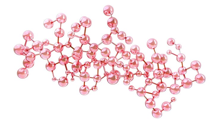 Foto há um objeto rosa com muitas bolas pequenas nele.