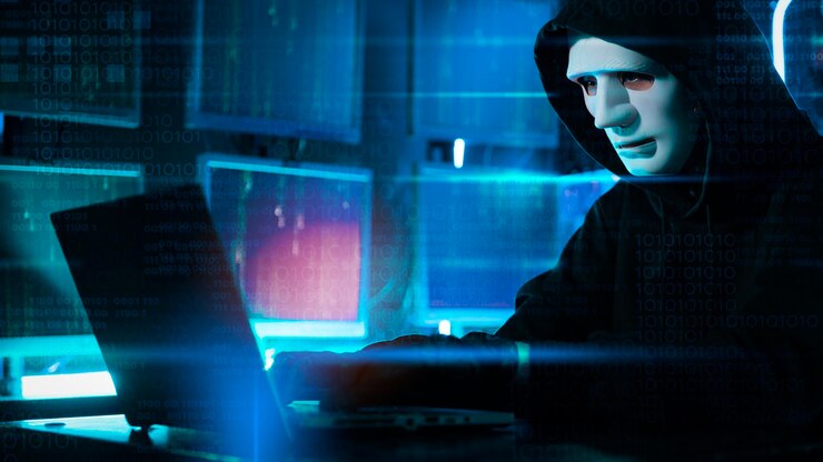 Foto un hacker está usando una computadora portátil para robar datos en la noche