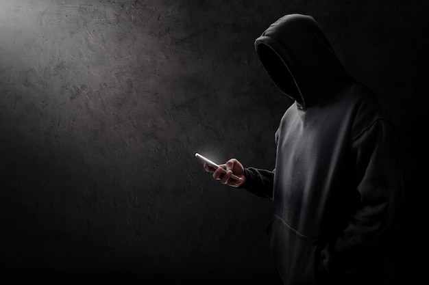 Hacker mit Handy