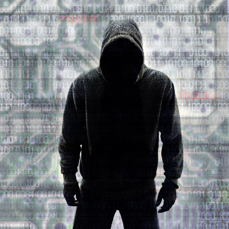 Foto hacker en silueta y códigos binarios