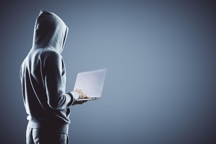 Foto hacker, tenencia, computador portatil