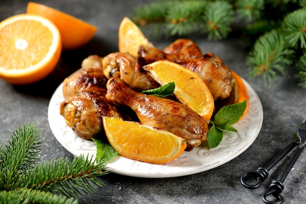 Hähnchenkeulen gebacken mit Orange und Minze