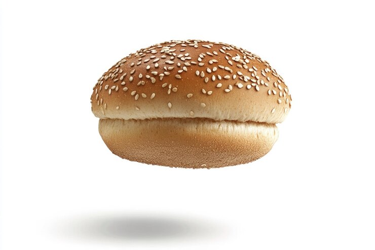 una hamburguesa está en el aire por encima de un pan