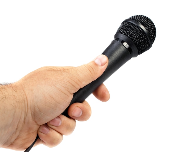 Hand hält ein mikrofon isoliert