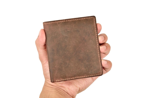 Hand mit braunem Leder Geldbörse isoliert auf weißem Hintergrund mit Beschneidungspfad