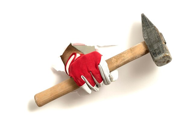 Hand mit einem Hammer