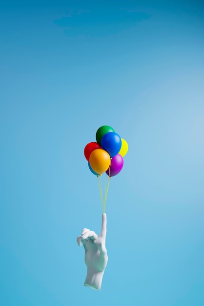 Hand mit Regenbogenballons während der LGBT-Wahl 3D-Rendering