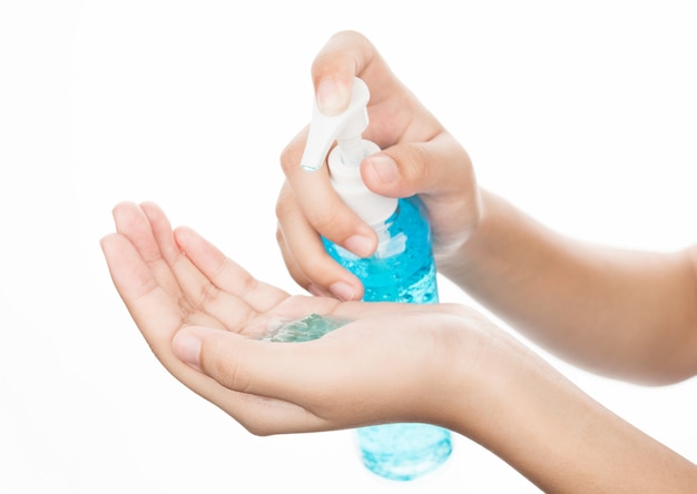 Hand waschen mit alkoholblauem Gel. Coronavirus-Prävention