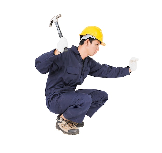 Handwerker in Uniform mit seinem Hammer