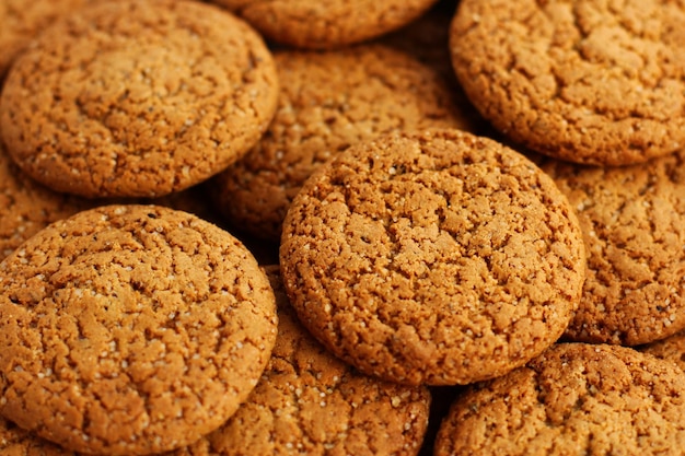 Hausgemachte knusprige Haferflockenkekse auf dem Tisch köstlicher süßer Snack Hintergrund Keksbeschaffenheit c ...