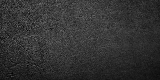 Foto hautoberfläche aus schwarzem leder als dunkler hintergrund