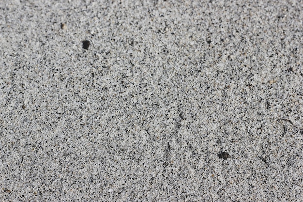 Hellbraune Sandbeschaffenheit des Strandes des Baikals