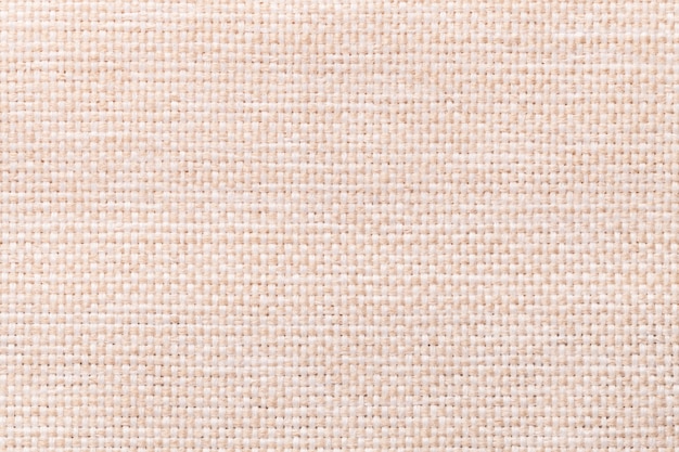 Helle beige Textilhintergrundnahaufnahme, Struktur des Gewebemakros