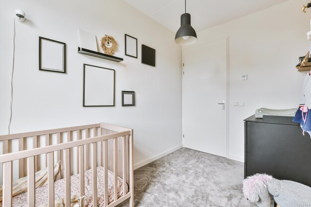 Foto helles gemütliches babyzimmer mit kinderbett