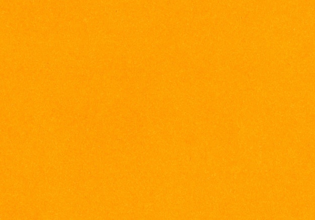 Helles, neonorangefarbenes unbeschichtetes Papier Textur Hintergrund feinkörnige Faserpartikel Copyspace Mockup