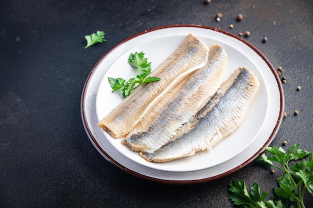 Hering Fischfilet frische Meeresfrüchte Mahlzeit Snack auf dem Tisch Kopie Raum Essen