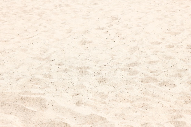 Foto hermosa arena en el fondo de la orilla del mar
