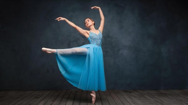 La hermosa bailarina bailando en un vestido largo azul